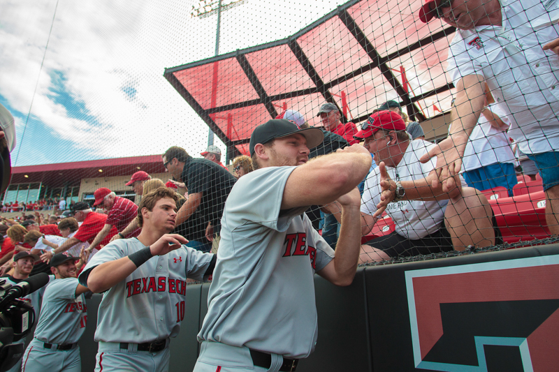 Texas Tech Baseball Players with Fans